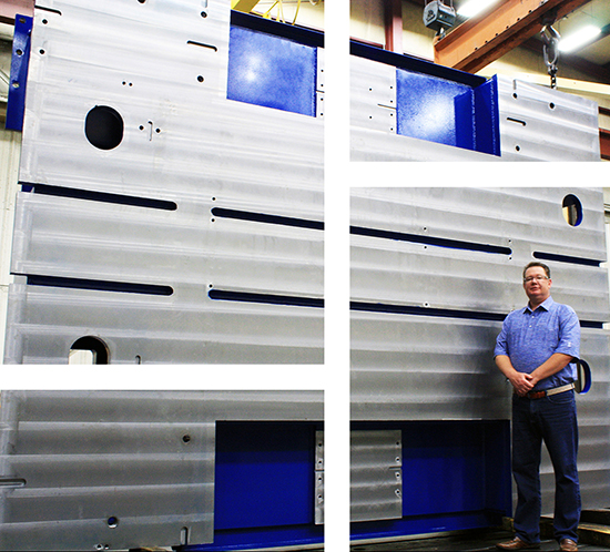 Kevin Febrey standing in front of large machine base