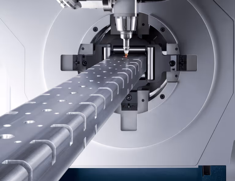 A Trumpf tube laser cuts holes and other shapes out of a rectangular steel tube