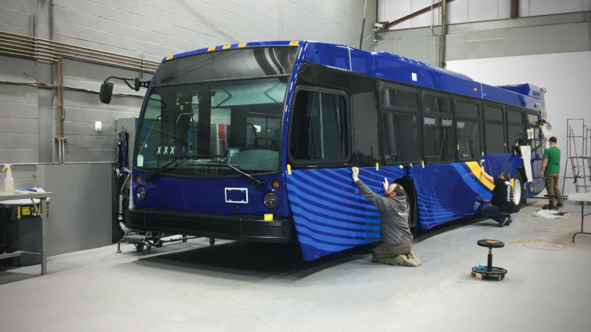 Installers getting a livery design properly in place